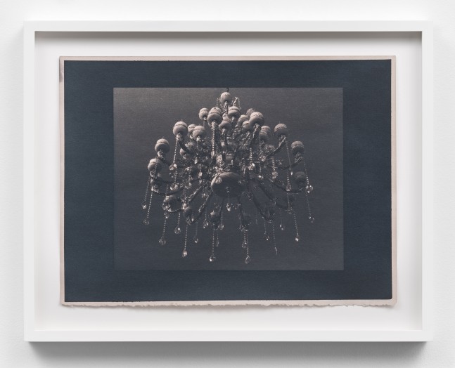 Scan of a rose toned cyanotype depicting a chandelier by Mickey Aloisio