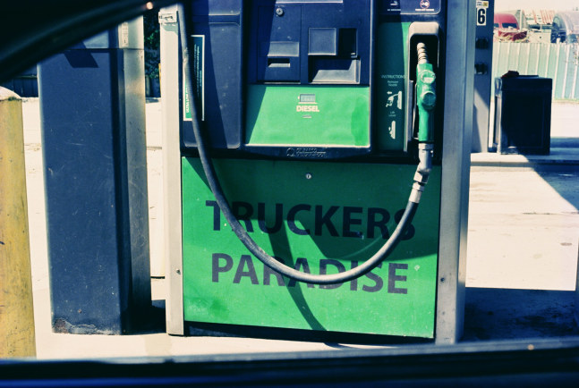 Image of a green diesel gas pump with the text &quot;TRUCKERS PARADISE&quot; by Mickey Aloisio
