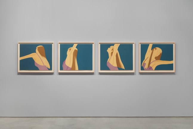 Installation view featuring four framed photographs by Alex Katz of woman wearing a purple leotard against a blue background dancing in motion