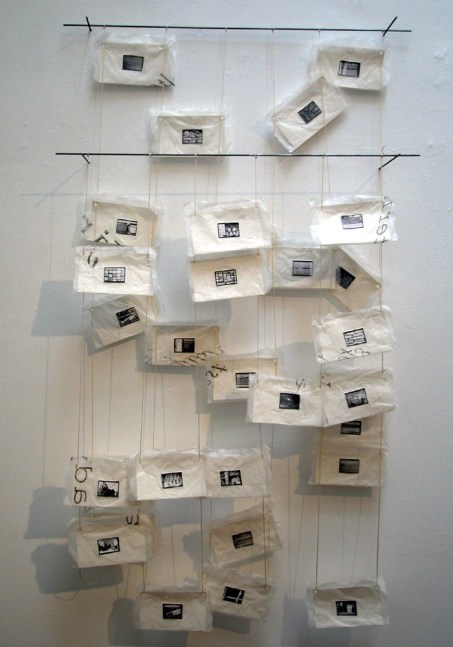 Much, 2005

Photographs, paper, thread, metal

42 x 24 x 6 inches