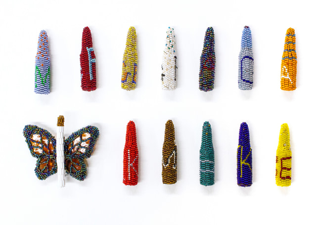 Excessive Froce, 2018
Glass beads, thread, glass, found object
Bullets: 2 7/8 x 3/4 x 3/4 in. (7.3 x 1.9 x 1.9 cm)
Butterfly: 3 1/2 x 3 1/4 x 1 1/4 in. (8.9 x 8.3 x 3.2 cm)
Beaded bullets with the initials of individuals who perished through the use of excessive force. Individuals include: Katheryn Johnson, Tamir Rice, Korryn Gaines, Trayvon Martin, Rodney King, Mike Brown, Philando Castille, Sandra Bland, Erica Garner, Amadou Diallo, Freddie Gray, Tanisha Anderson, Eric Garner's Soul (Butterfly)
Scot-1151-C