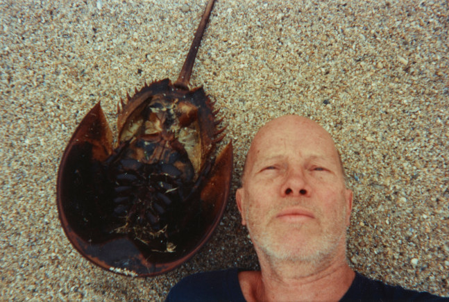 Ray Johnson, Untitled (Self Portrait with Horseshoe Crab), September 1994, Commercially processed chromogenic print, 6 x 4 inches, Collection of The Morgan Library &amp;amp; Museum