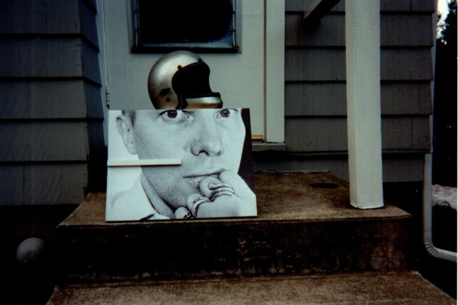 Ray Johnson, Untitled (Self Portrait with Helmet), circa 1993, Commercially processed chromogenic print, 6 x 4 inches, Collection of The Morgan Library &amp;amp; Museum