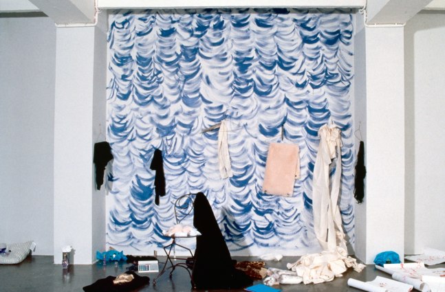 Fashion Shop

1992

Blue veil curtain, wrought iron chair, gold painted wire coathangers, fashion

items, tights, perfume bottles, fashion phone and assorted jewelry

330 x 178 x 178 cm / 130 x 70 x 70 in

&amp;copy; Karen Kilimnik