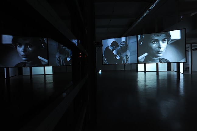 Installation view of video work by Douglas Gordon