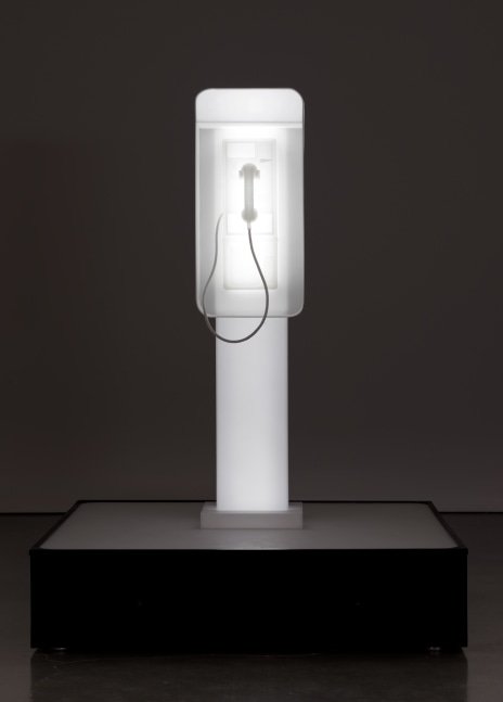 Phonebooth sculpture by Doug Aitken, twilight 2014 Cast resin, acrylic, responsive LEDs 182 x 138 x 138 cm / 71 3/4 x 54 1/4 x 54 1/4 in ​Edition of 4 + 2 AP © Doug Aitken