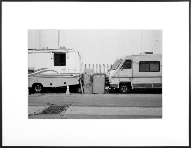(Temporary) Homes for America: 3300 block to 4400 block, Union Pacific Avenue, between South Grande Vista Avenue and South Marianna Avenue, Los Angeles/Commerce, California, December 2020
2021
Black and white fiber print
Ed. 1/1 + 1 AP
Sheet 20.5 x 30.5 cm / 8 x 12 inches

BESHT48012