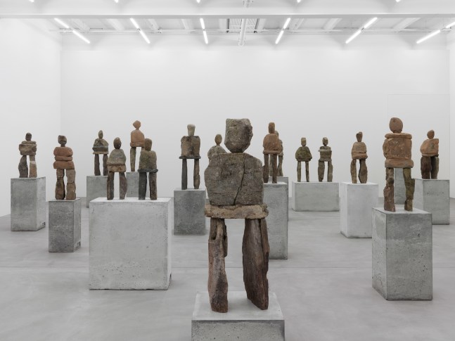 Installation view of Ugo Rondinone stone figure sculptures