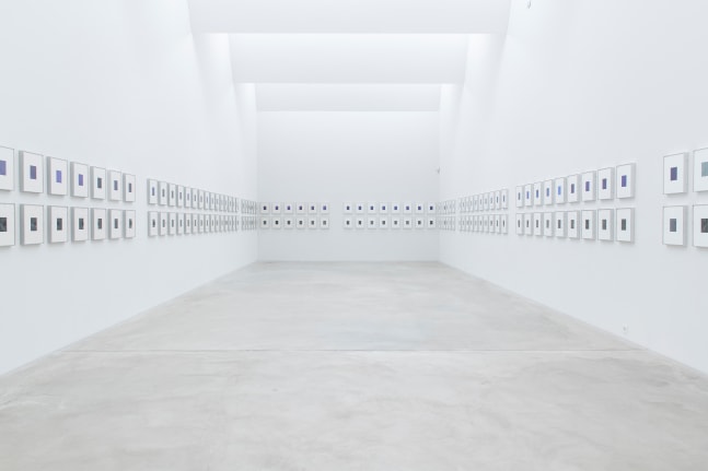 Installation view of wall works by Walead Beshty