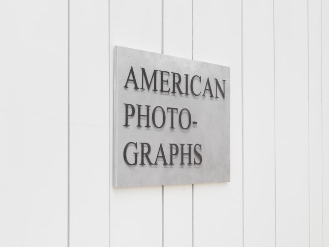 Installation view of photographs by Shannon Ebner