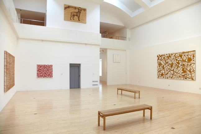 Installation view of works by Tim Rollins and K.O.S.