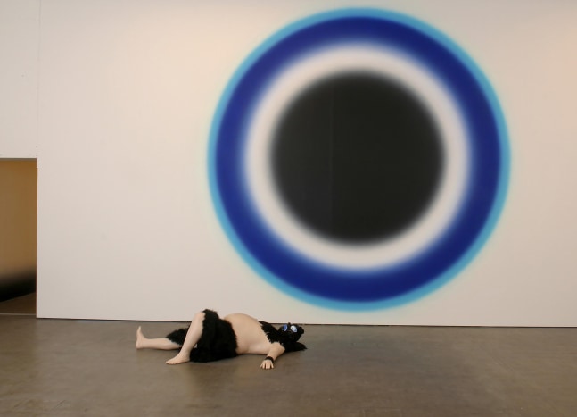 Installation view of sculpture and painting by Ugo Rondinone