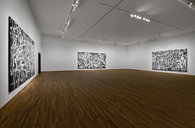 Installation view of black and white paintings by Adam Pendleton