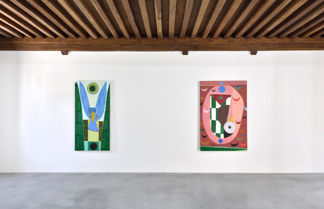 Installation view of paintings and sculptures by Austin Eddy