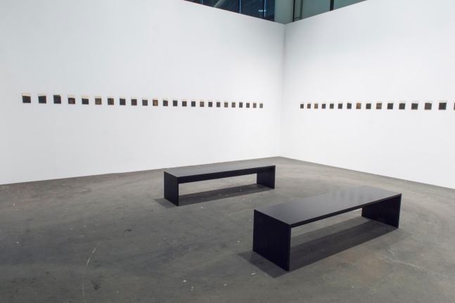 Installation view of paintings by Tim Rollins and K.O.S.