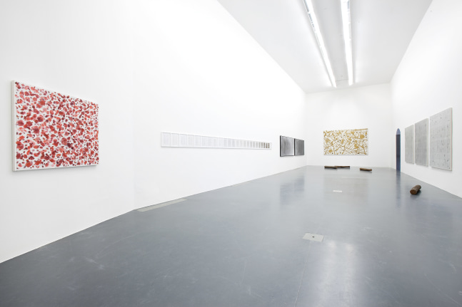 Installation view of paintings by Tim Rollins and K.O.S.