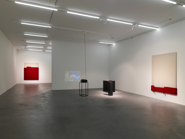 Installation view of paintings, video works and wall works by Latifa Echakhch
