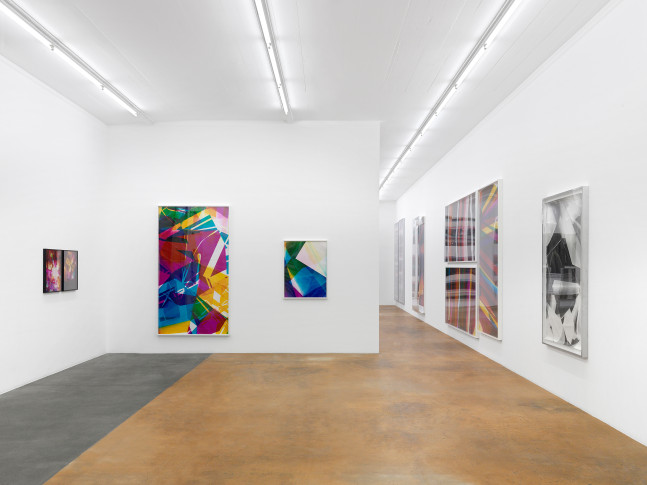 Installation view of wall works by Walead Beshty