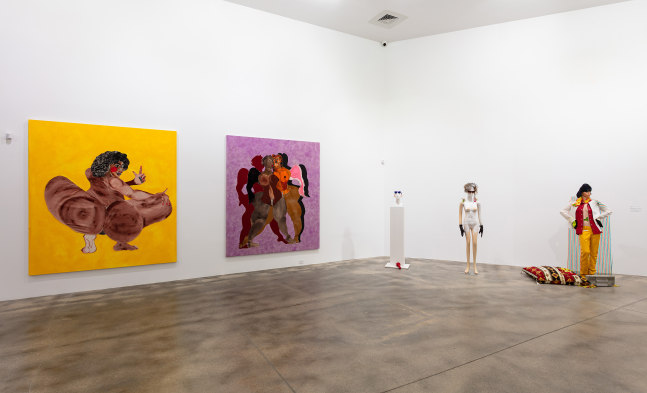 Installation view of paintings by Tschabalala Self