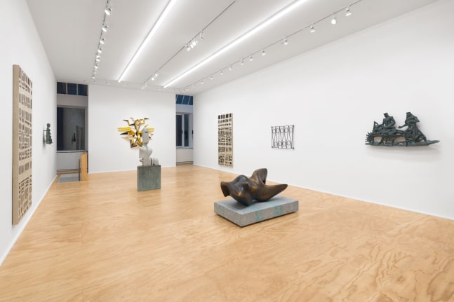 Installation view of sculptures and wall works by Valentin Carron