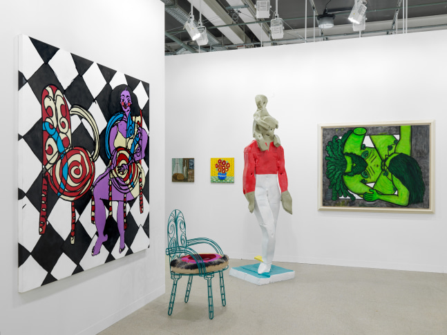 installation view of paintings and sculptures by various artists
