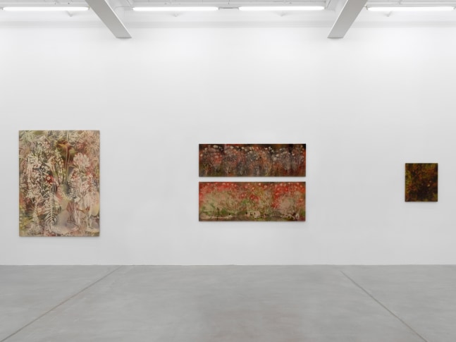 Installation view of Sam Falls paintings and ceramic reliefs exhibition