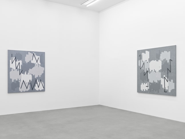 installation view of grayscale paintings by Amy Feldman