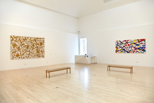 Installation view of works by Tim Rollins and K.O.S.