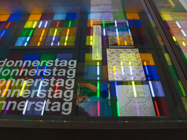 Installation view of sculptures and light installations by Liam Gillick