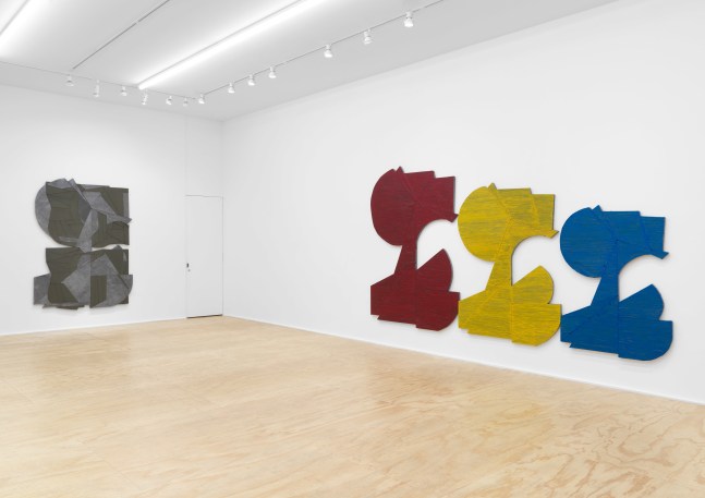 Installation view of Wyatt Kahn wall reliefs and works on paper