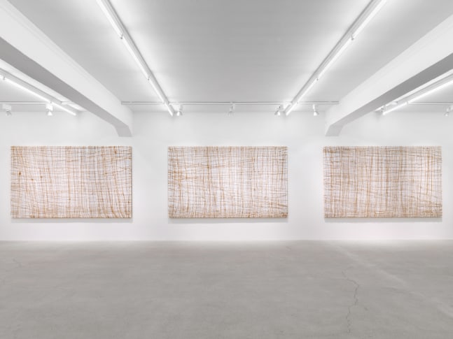 Installation view of Tim Rollins and K.O.S. paintings and text works exhibition