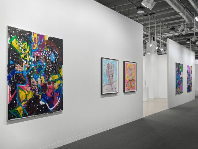 installation view of works by various artists at the Art Basel booth