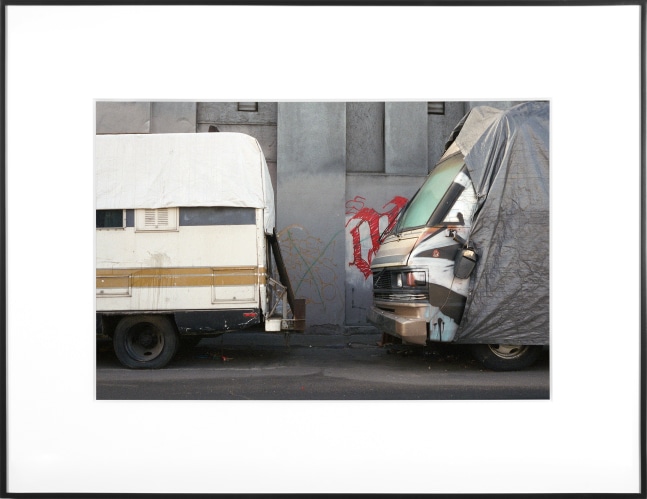 (Temporary) Homes for America: 3300 block to 4400 block, Union Pacific Avenue, between South Grande Vista Avenue and South Marianna Avenue, Los Angeles/Commerce, California, December 2020
2021
Chromogenic print
Ed. 1/1 + 1 AP
Sheet 20.5 x 30.5 cm / 8 x 12 inches

BESHT48019