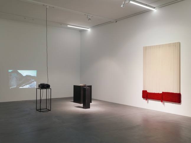 Installation view of paintings, video works and wall works by Latifa Echakhch