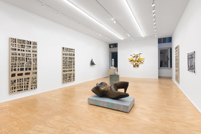 Installation view of sculptures and wall works by Valentin Carron