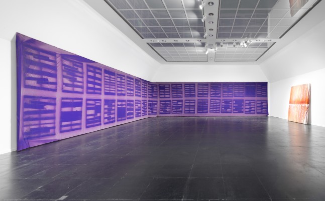 Installation view of paintings by Sam Falls