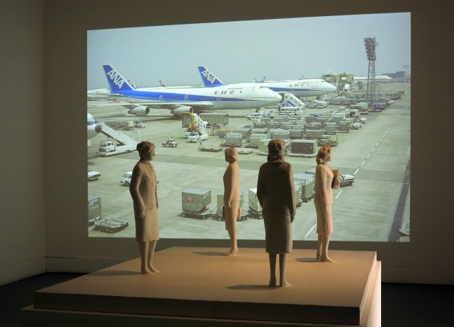 Installation view of video work and sculptures by Peter Fischli and David Weiss