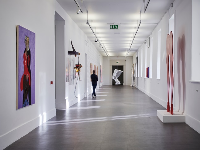 Installation view of painting by Tschabalala Self