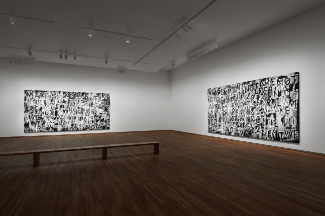Installation view of black and white paintings by Adam Pendleton