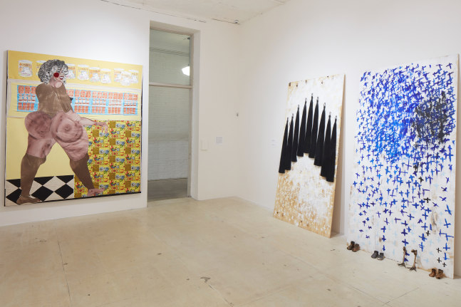 Installation view of paintings by Tschabalala Self