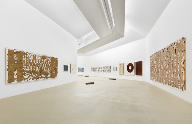 Installation view of paintings by Tim Rollins and K.O.S.