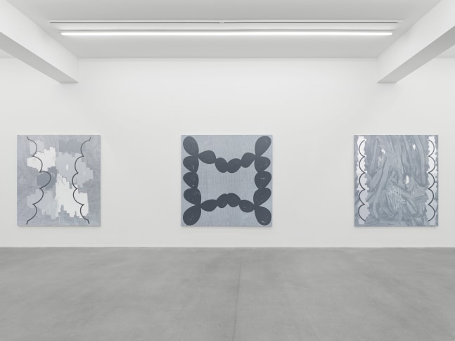 installation view of grayscale paintings by Amy Feldman