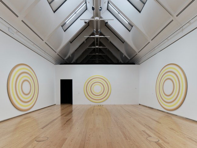 Installation view of paintings and sculptures by Ugo Rondinone