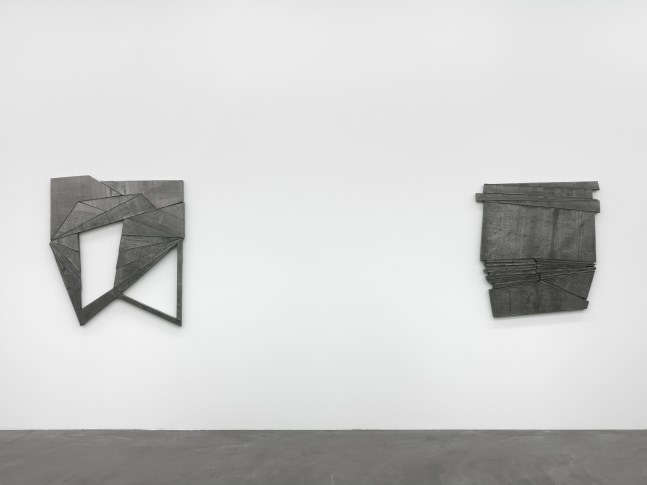 Installation view of Wyatt Kahn wall reliefs and photographs