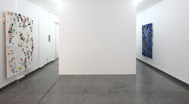Installation view of paintings by Alex Hubbard