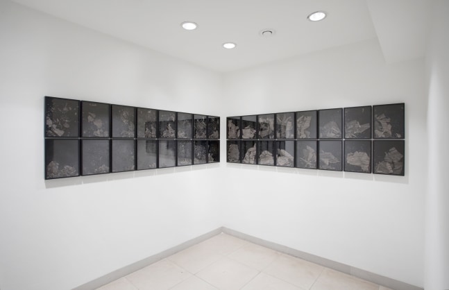 Installation view of photographs by Douglas Gordon