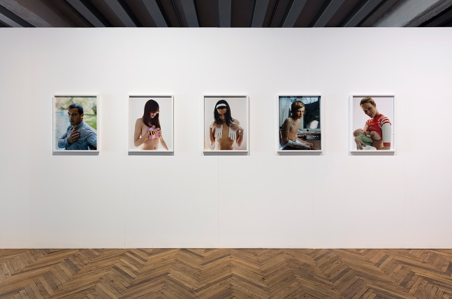 Installation view of photographs by Torbjørn Rødland
