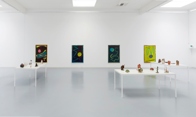 Installation view of sculptures and paintings by Josh Smith