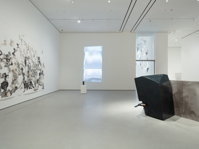 Installation view of video by Trisha Donnelly and works of other artists