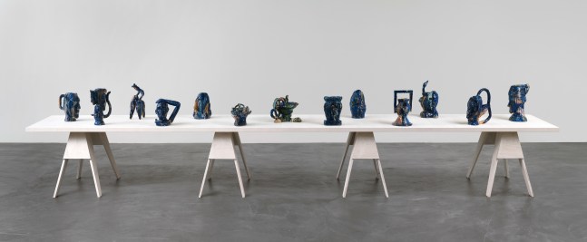 Group of sculptures by Andrew Lord on table
